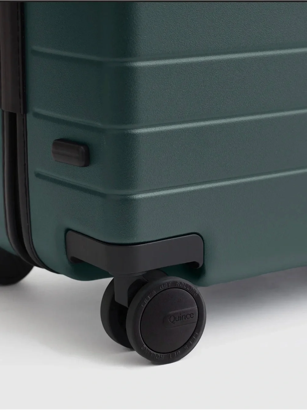 Quince Dark Green Hard-Shell Spinner Carry-On